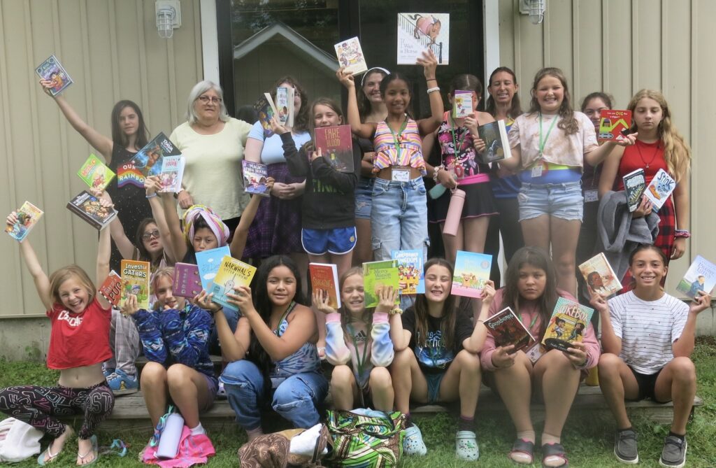 Campers showing off their books from CLiF